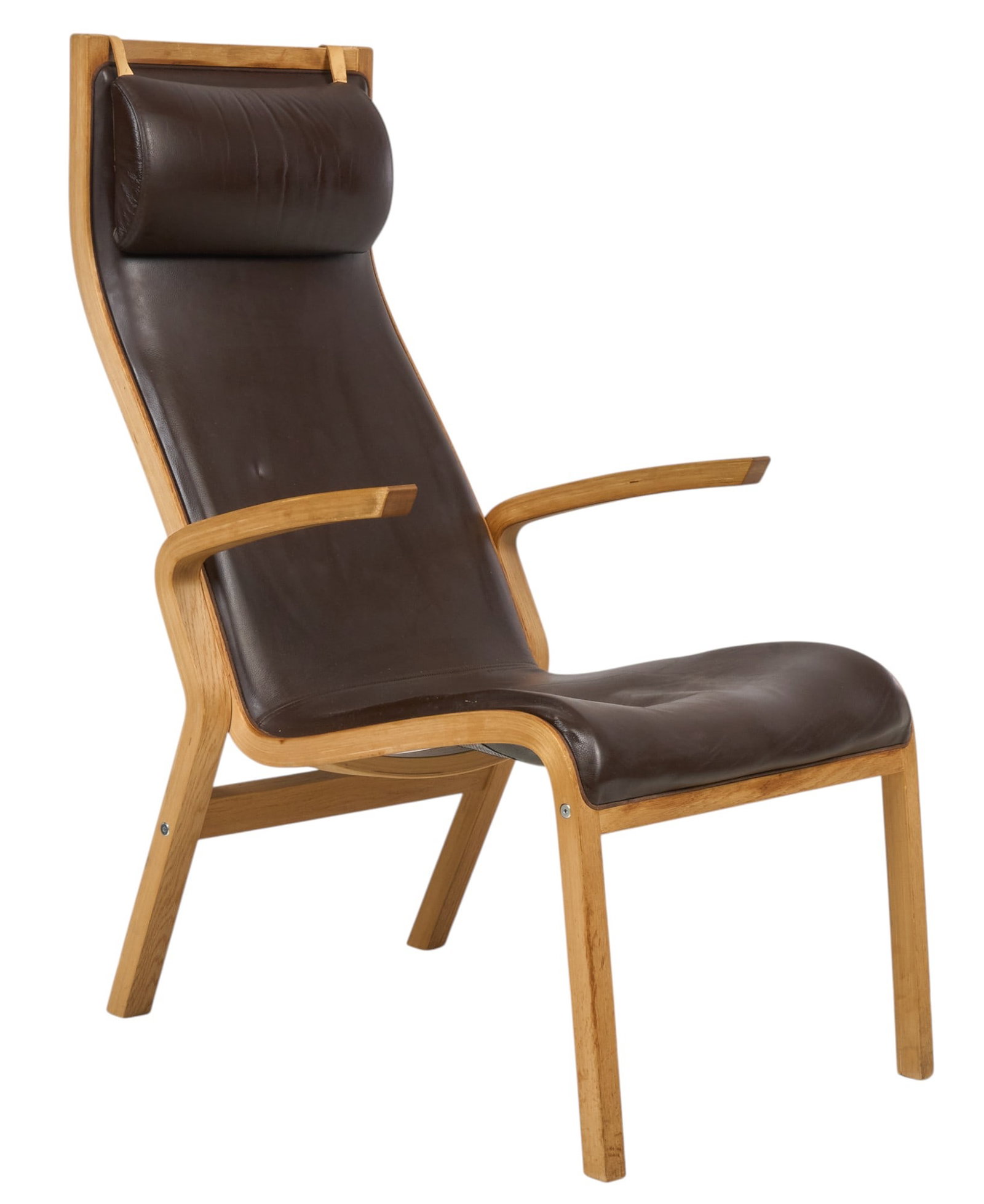 Danish Mid-Century Armchair: Danish mid-century armchair with brown leather seat and back, with head cushion, on wooden frame height 41 in. x depth 34 in. x width 24.5 in. Provenance: Imported directly from Denmark to Vogt Auctio