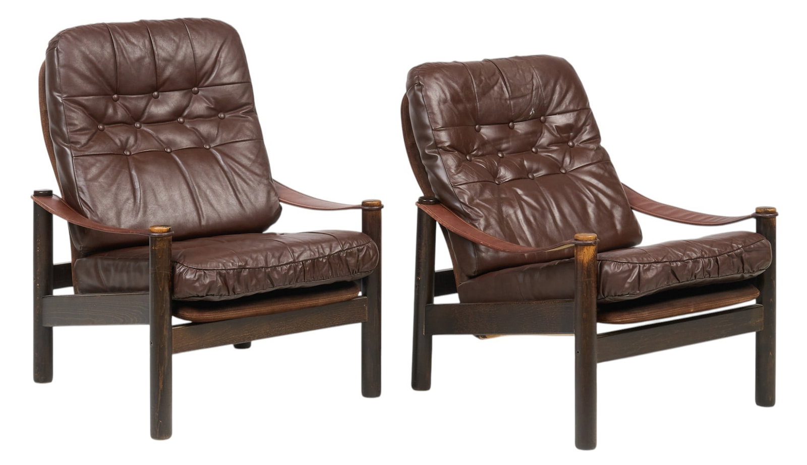 Pair of Mid-Century Leather Lounge Chairs: Pair of Danish mid-century lounge chairs with tufted brown leather upholstery and bentwood frames height 37 in. x width 29 in. x depth 32 in. / largest Provenance: Imported directly from Denmark 