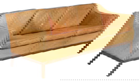 Danish Mid-Century Leather Sofa: Danish mid-century leather sofa, supported on wooden block legs height 30 in. x width 76 in. x depth 31 in. Provenance: Imported directly from Denmark to Vogt Auction, curated from Danish estates and