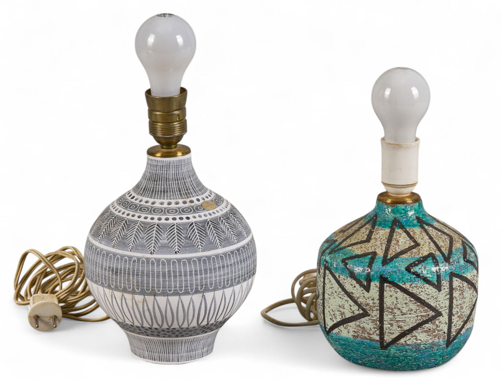 (2) Upsala Ekeby (SE) Lamps: Two ceramic lamps by Upsala Ekeby (Sweden), both with geometric motifs throughout, both lamps with European type-C plugs gray lamp: height 11 in. x width 6.5 in. x depth 6.5 in.blue lamp: height 9 in.