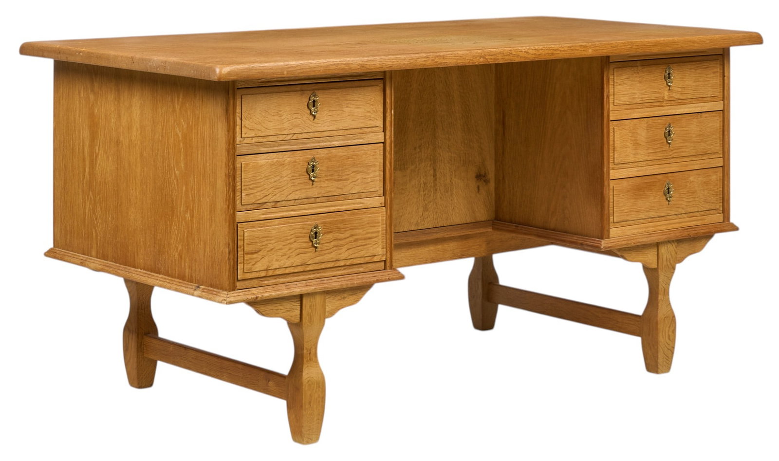Henning Kjnaernulf (DNK) Mid-Century Desk: Henning Kjnaernulf (Denmark) mid-century desk with oversize top, and six drawers, with cabinet door on opposite side, supported on carved legs height 29.5 in. x width 59 in. x depth 29.5 in.&nbs