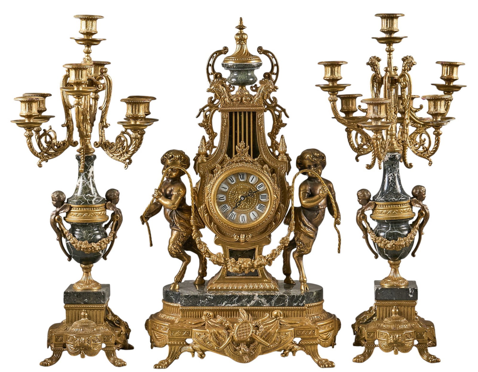 Louis XVI Style Bronze and Marble Clock Garniture: Louis XVI style brass and marble clock garniture with candelabra with satyr figures height 24 in/ x width 15 in. x depth 8 in. / clock Provenance: Property from a home in San Antonio, Texas 
