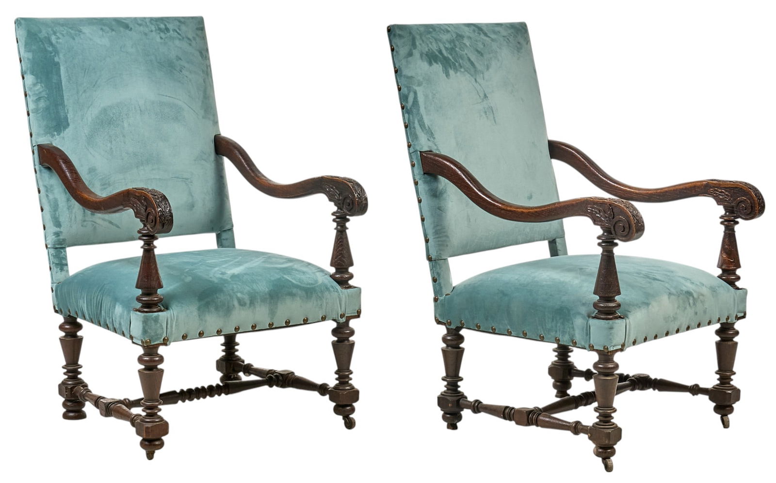 Pair of Louis XV Style Oak Armchairs: Pair of antique Louis XV style oak chairs with barley twist legs ending on casters, and newly upholstered seats and backs in Thibaut 1886 Savor Lagoon fabric, chair circa 19th century height 42 i