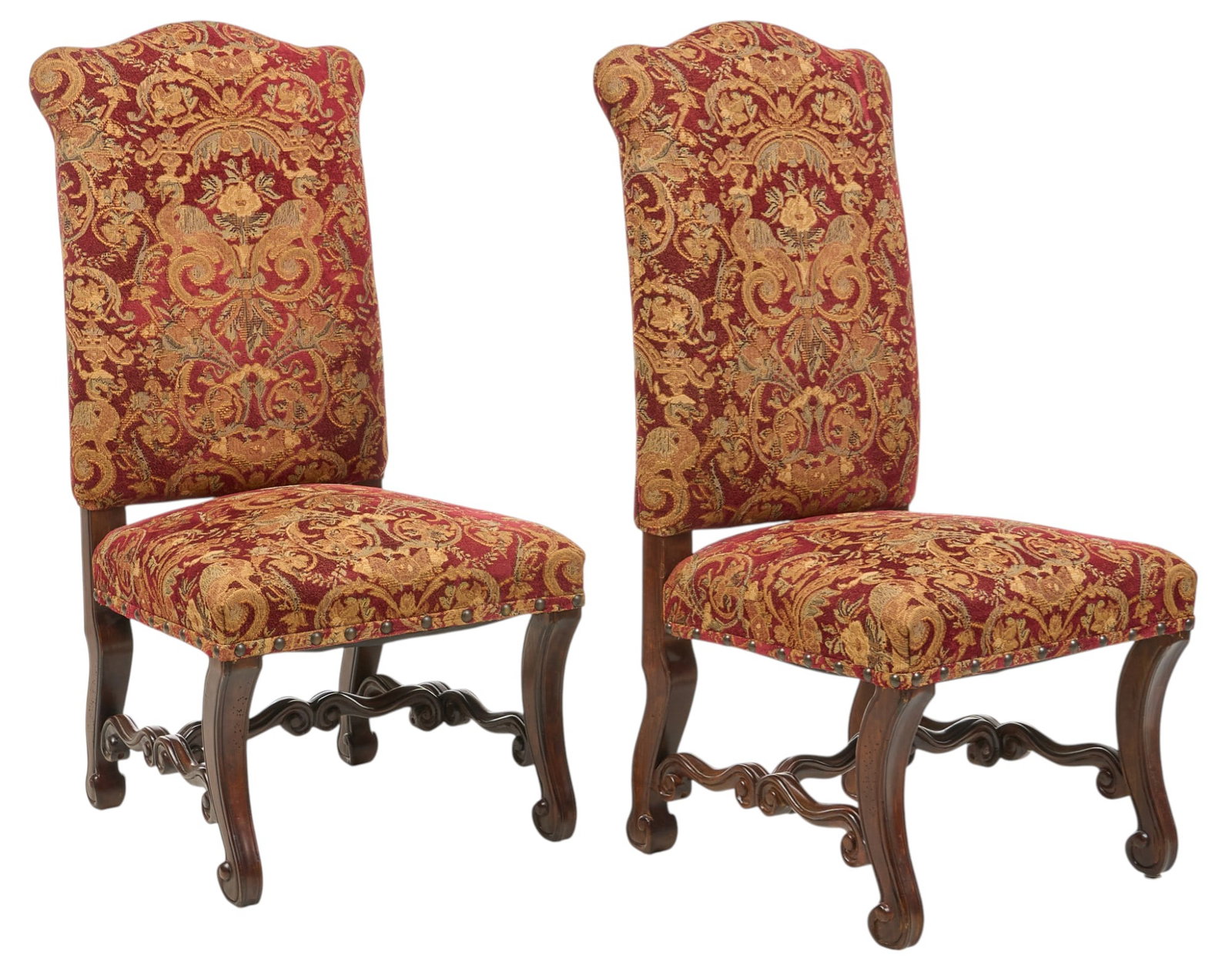 Pair of Upholstered Dining Chairs: Pair of upholstered dining chairs, with red fabric, on double-stretchered wooden cabriole legs height 48 in. x width 23 in. x depth 24 in. Provenance: Property from a home in Windcrest, Texas