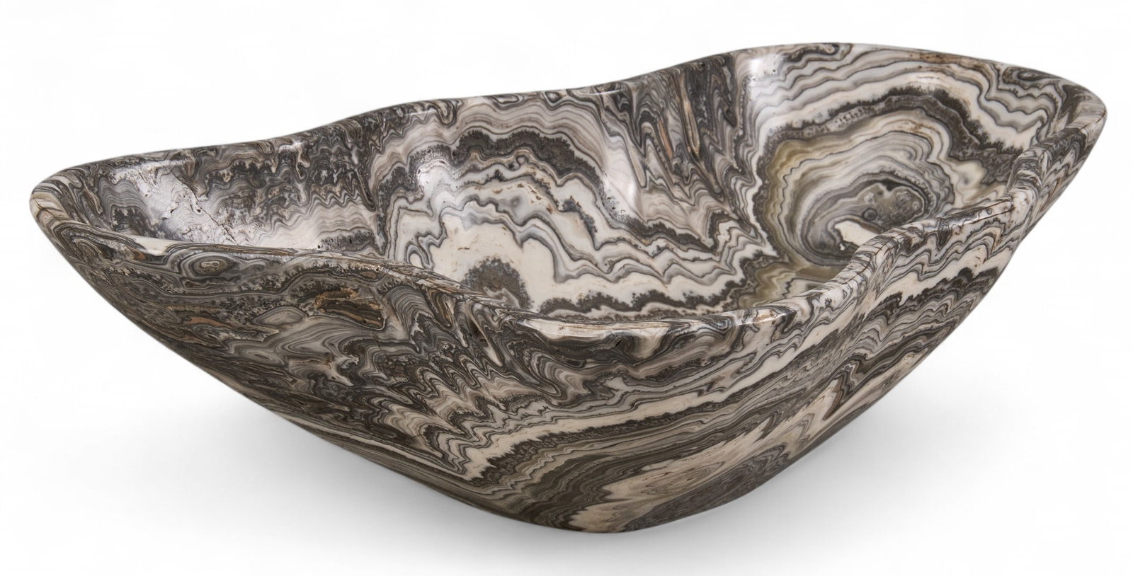 Zebra Onyx Bowl: Zebra onyx bowl height 14 in. x 10 in. x 4.5. in Total weight: 5.6 lbs Provenance: Property from a home in Boerne, Texas