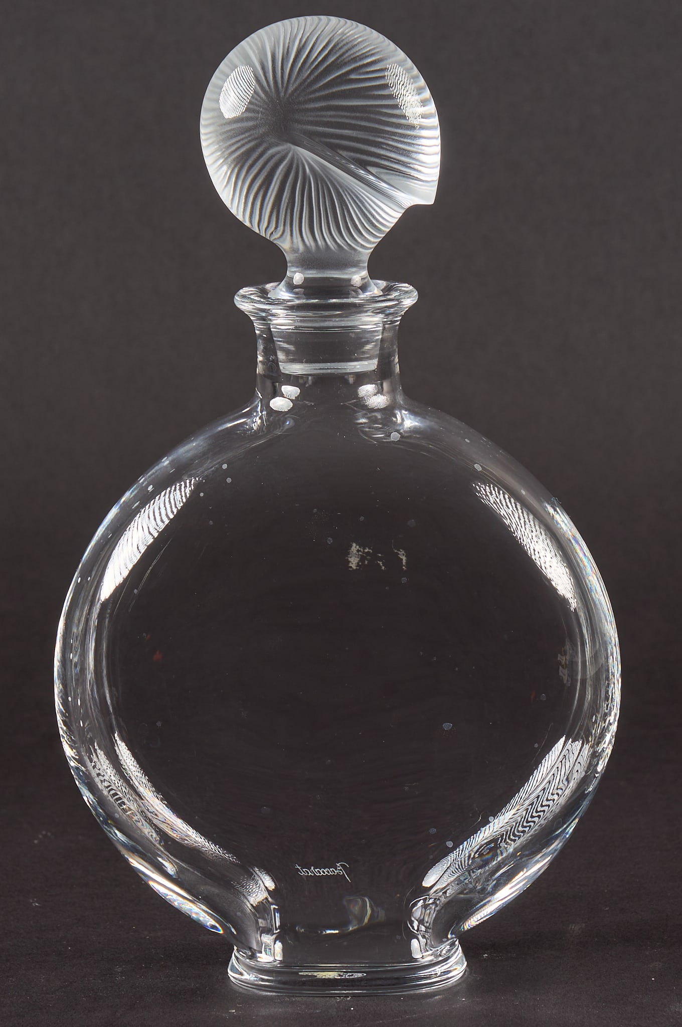 Baccarat Crystal Decanter: Baccarat crystal decanter with stopper, marked Baccarat to underside height 11 in. x width 6.5 in. x depth 2 in. Provenance: Property from a home in San Antonio, Texas