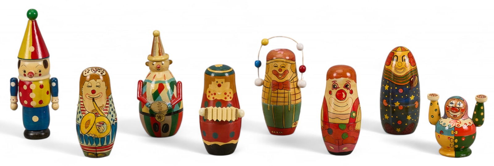 (8) Russian Matryoshka Nesting Dolls, Clowns: Set of eight hand-painted Russian Matroyshka nesting dolls depicting clowns height 8.5 x width 3.5 x depth 3 in. / tallest Provenance: Property from the Hill Country Village home of late celebrat