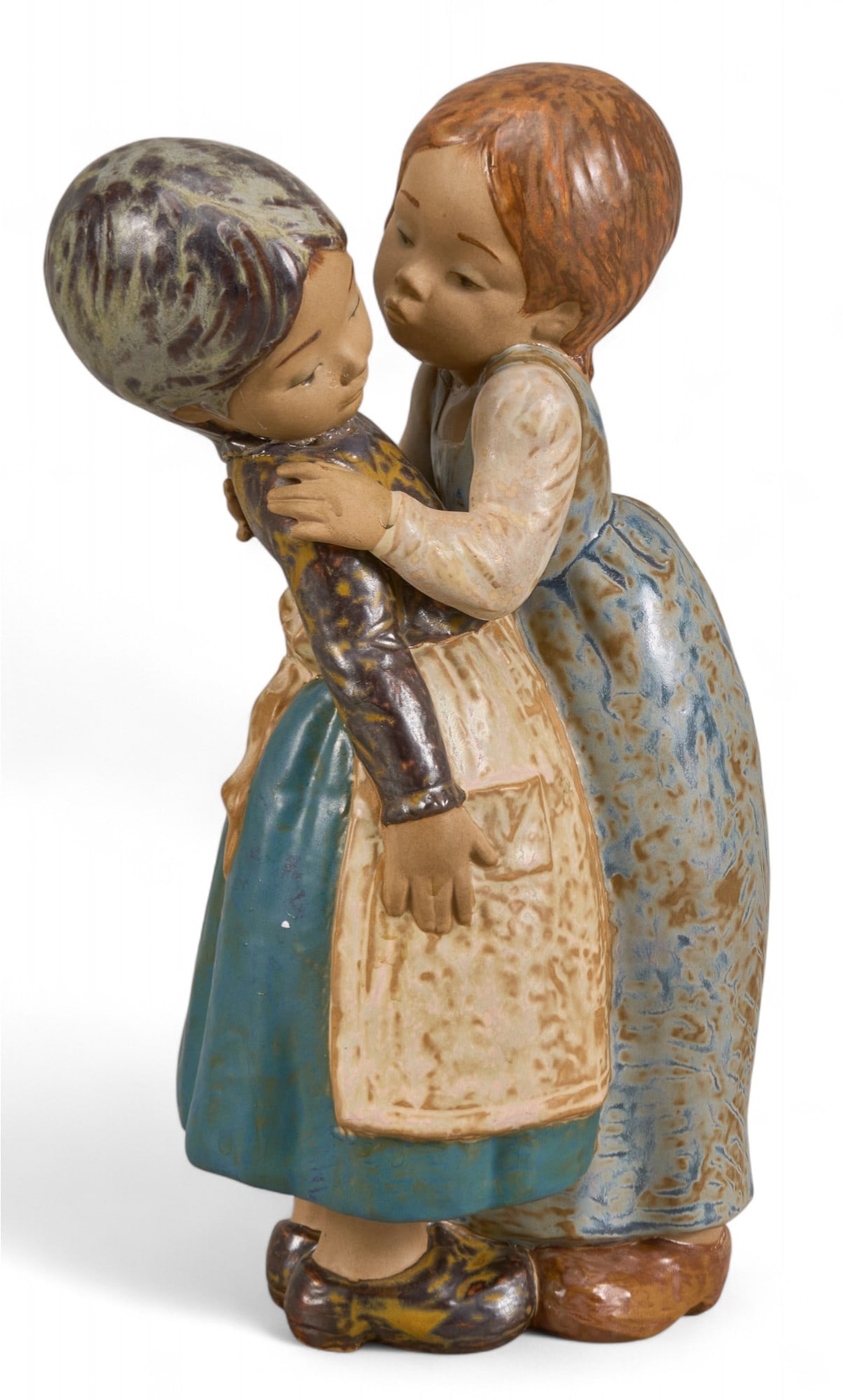 Lladro (ES), "The Little Kiss": Lladro (Spain) porcelain figure, titled "The Little Kiss", produced from 1978-85 height 11 in. x width 5.5 in. x depth 4 in. Provenance: Property from the estate of late teacher and philanth