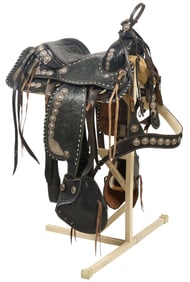 Western Saddle with Silver Conchos
