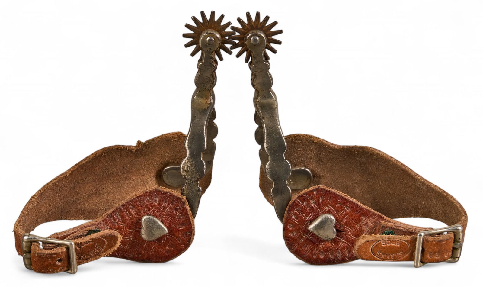 Pair of August Buermann Spurs: Pair of August Buermann cowboy spurs, unmarked, with 15 point rowels, heart buttons, Shank Bros marked straps