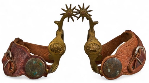 Pair of Star Marked Indian Chief Pattern Spurs