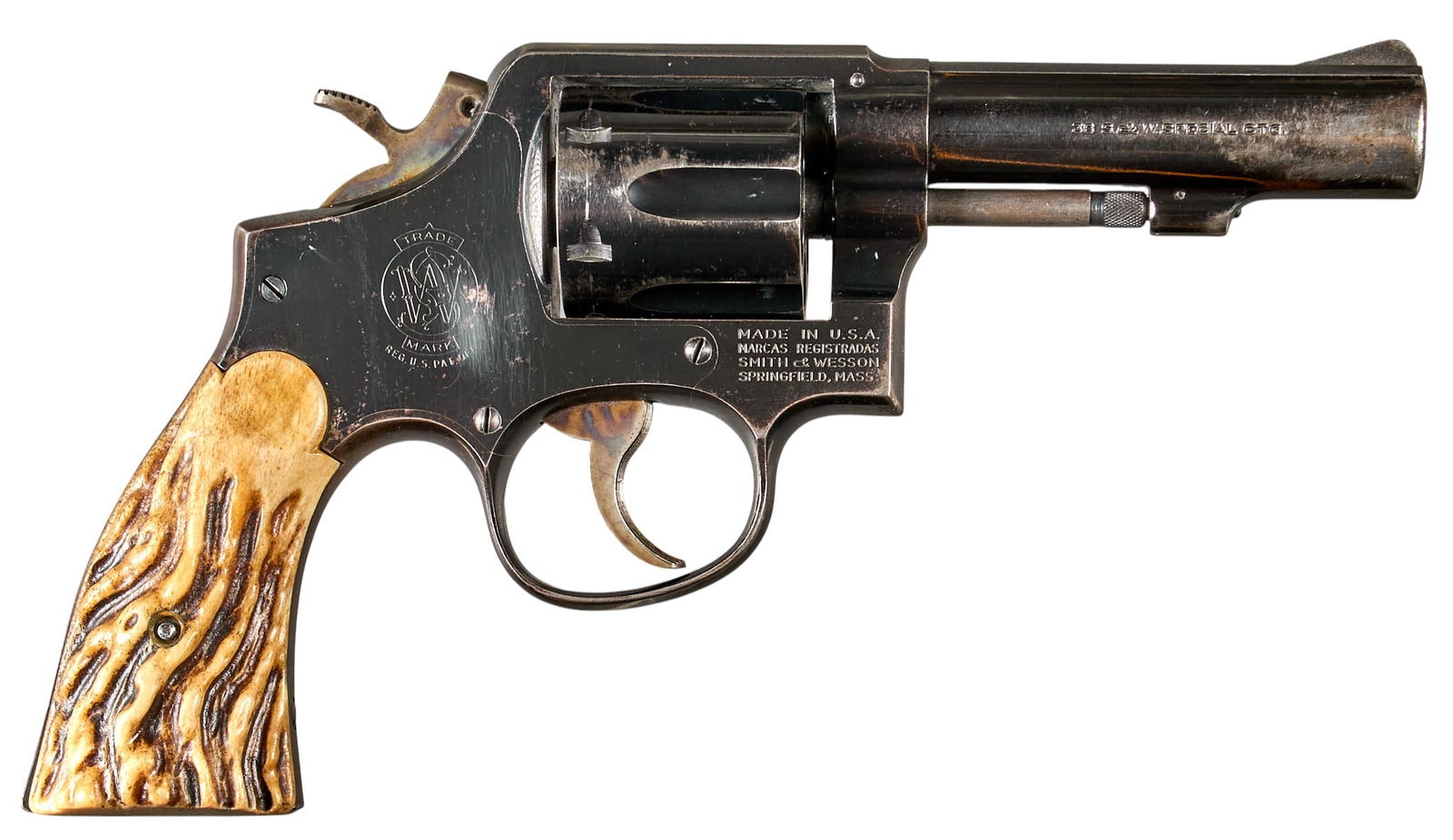 Smith & Wesson Model 10-6 38 SPL Heavy Barrel Revolver: Serial: C603534 Manufacturer: Smith & Wesson (c. 1962) Model: 10-6 Caliber: 38 Special Barrel length: 4 in. OAL: 9.5 in. Condition: Good; grips have moderate wear & patina; b