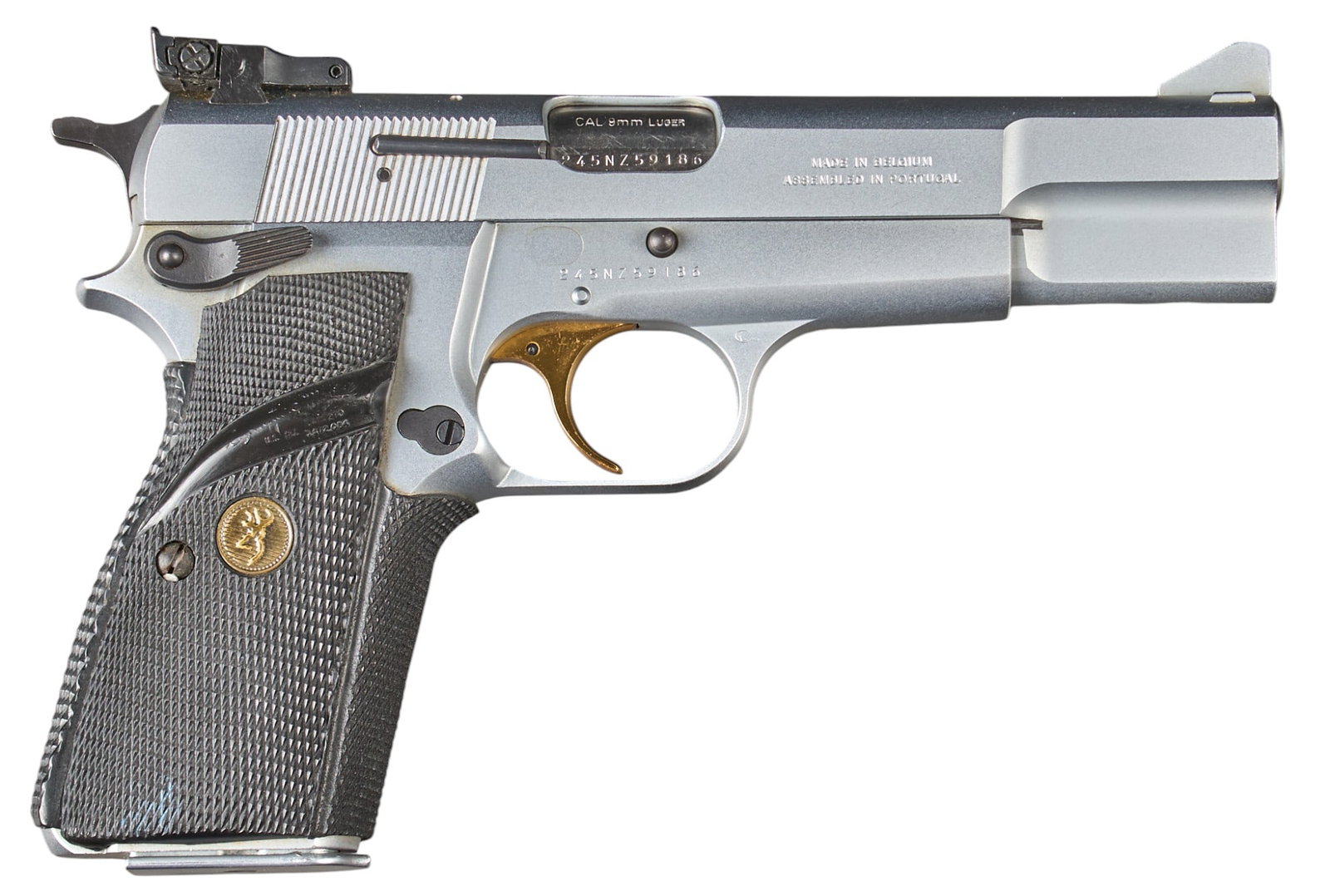 Belgian Browning Hi Power 9mm Semi Auto Pistol: Serial: 245NZ59186 Manufacturer: FN-Belgium / Portugal / Browning Arms Co. (c. 1991) Model: Hi Power Caliber: 9mm Barrel length: 4.75 in. OAL: 7.875 in. Condition: Very Good; Pachma