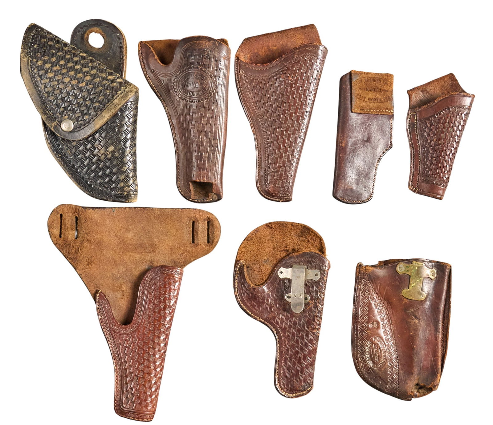 Collection of 8 Basket Weave Tooled Leather Holsters: Collection of 8 basket weave tooled leather holsters Features: (1) Henry Nordhaus - Deming, NM 45 "X" pattern holster; (2) C.I. Tibiletti - Victoria, Tex. basket weave tooled; (3) A. Metz -