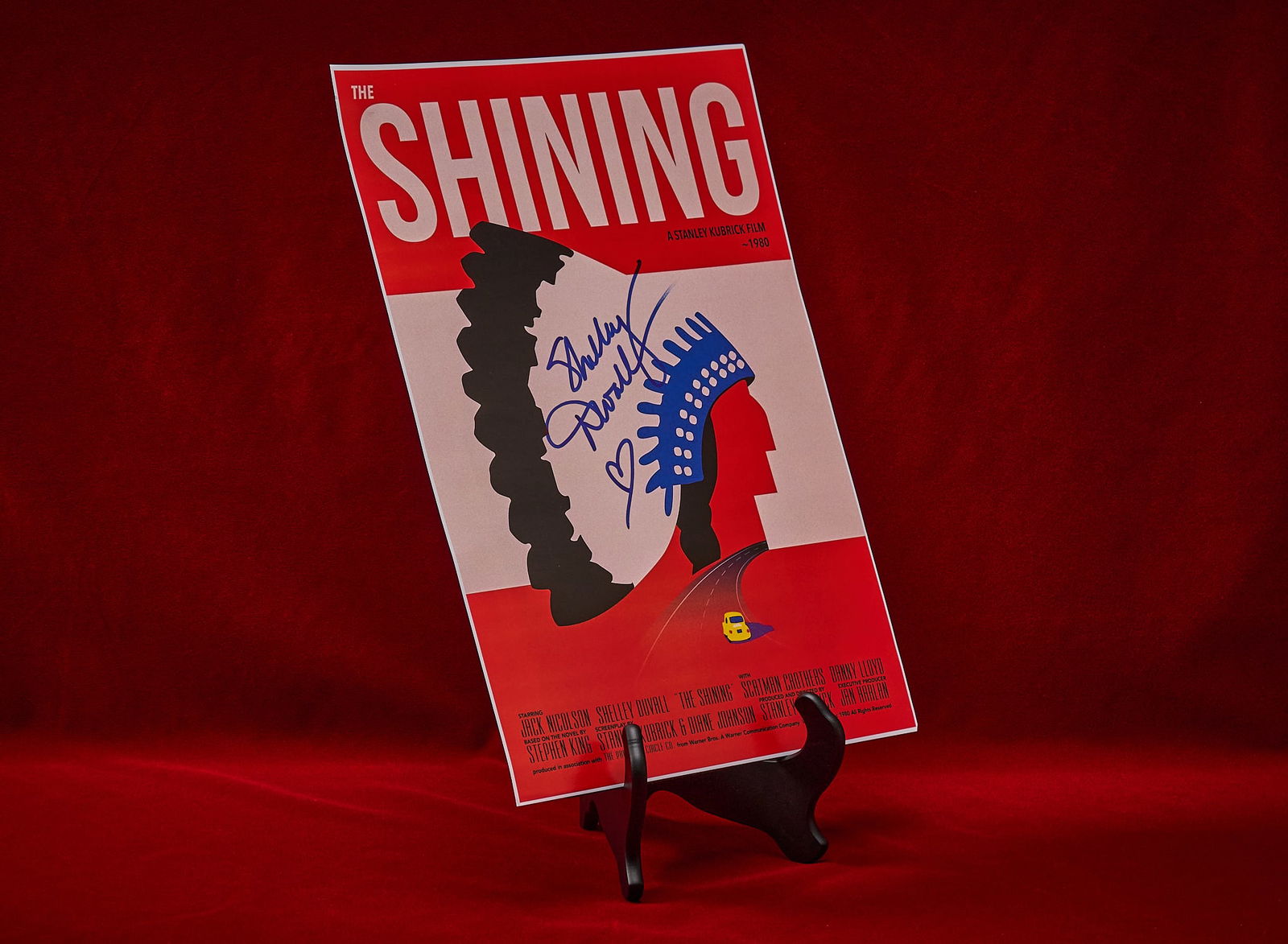 Shelley Duvall | Signed "The Shining" Poster: Collectible print of an iconic alternative movie poster for "The Shining" (1980) portraying a Native American figure in headdress, recognizing the symbolism present throughout the movie,&nbs