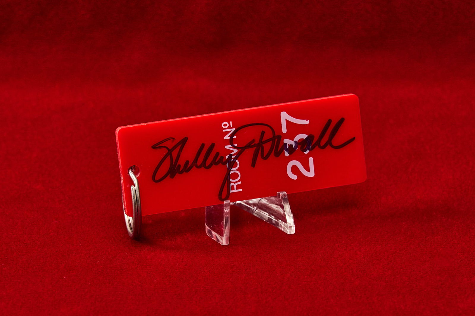 Shelley Duvall | Signed "The Shining" Hotel Key: Prop-accurate collectible reproduction hotel key tag for room 237 at "The Overlook", the iconic fictional hotel featured in "The Shining" (1980), signed by Shelley Duvall who