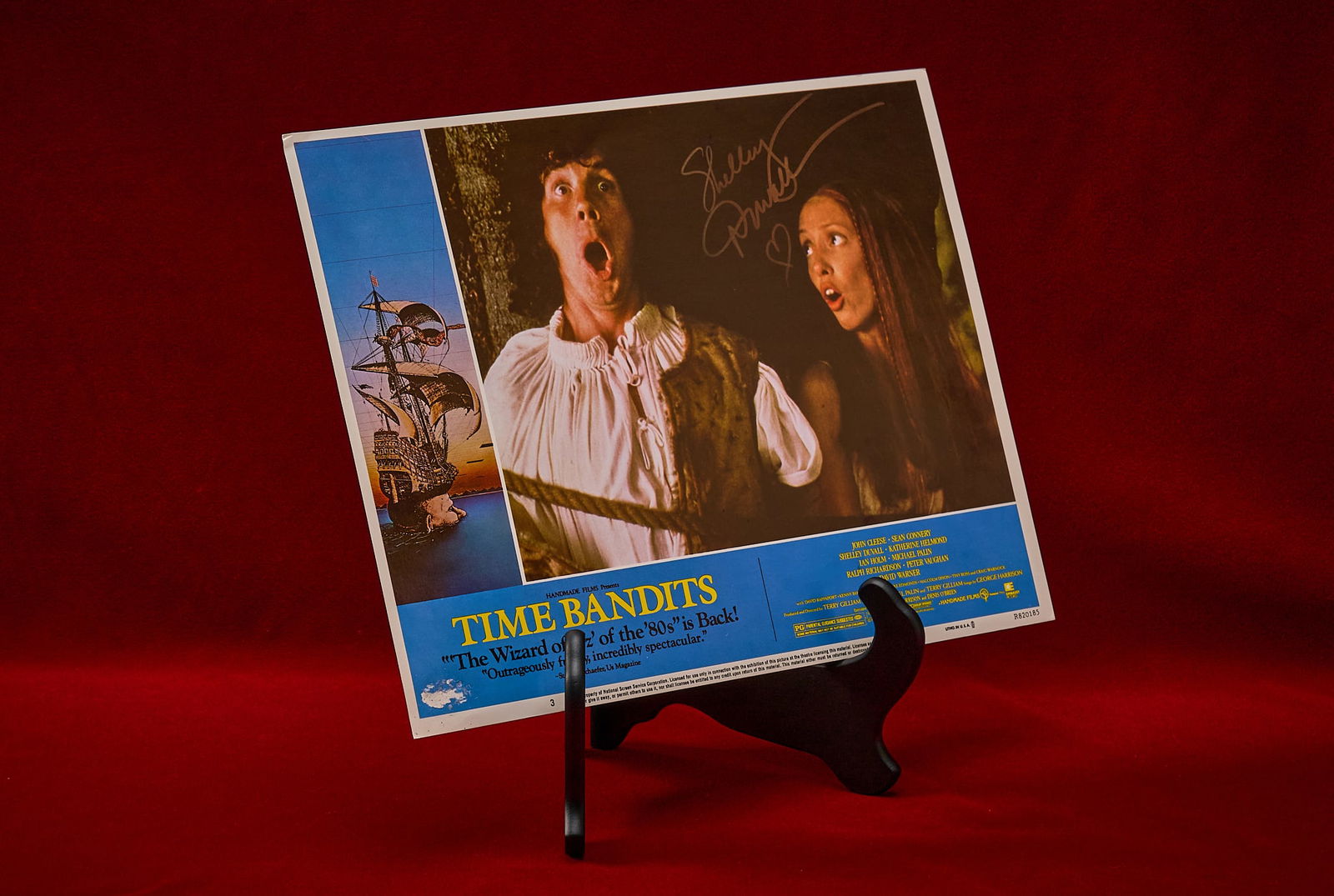 Shelley Duvall | Signed "Time Bandits" Lobby Card: Original theater lobby card for "Time Bandits" (1981), numbered 3, featuring scene with Michael Palin as Vincent and Shelley Duvall as Pansy, produced by the National Screen Service Corporat