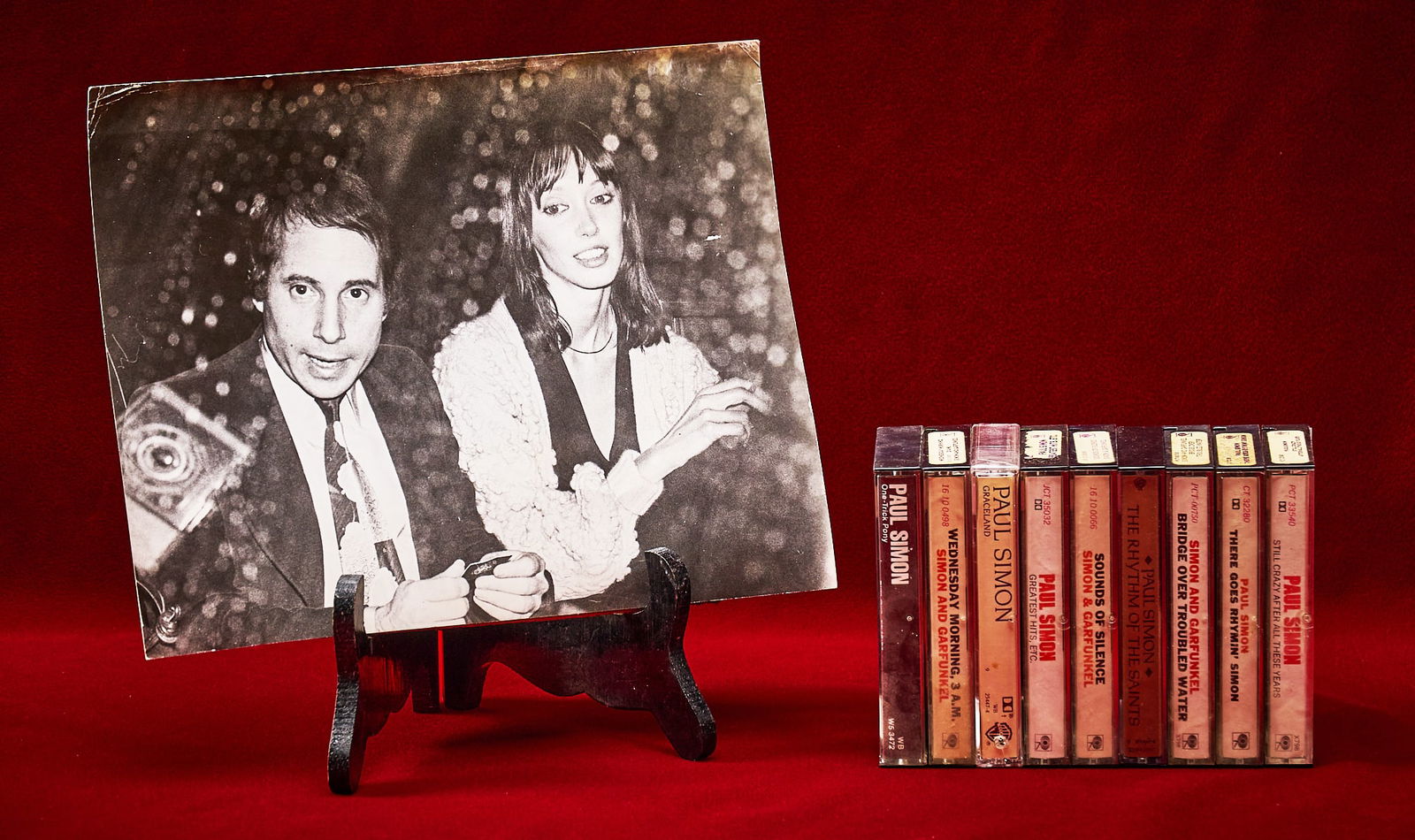 Shelley Duvall | Paul Simon Cassettes: Collection of Paul Simon and Simon & Garfunkel cassette tapes, all in original cases, some of which are pre-release demonstration copies, also includes photograph of Shelley Duvall with Paul Simon