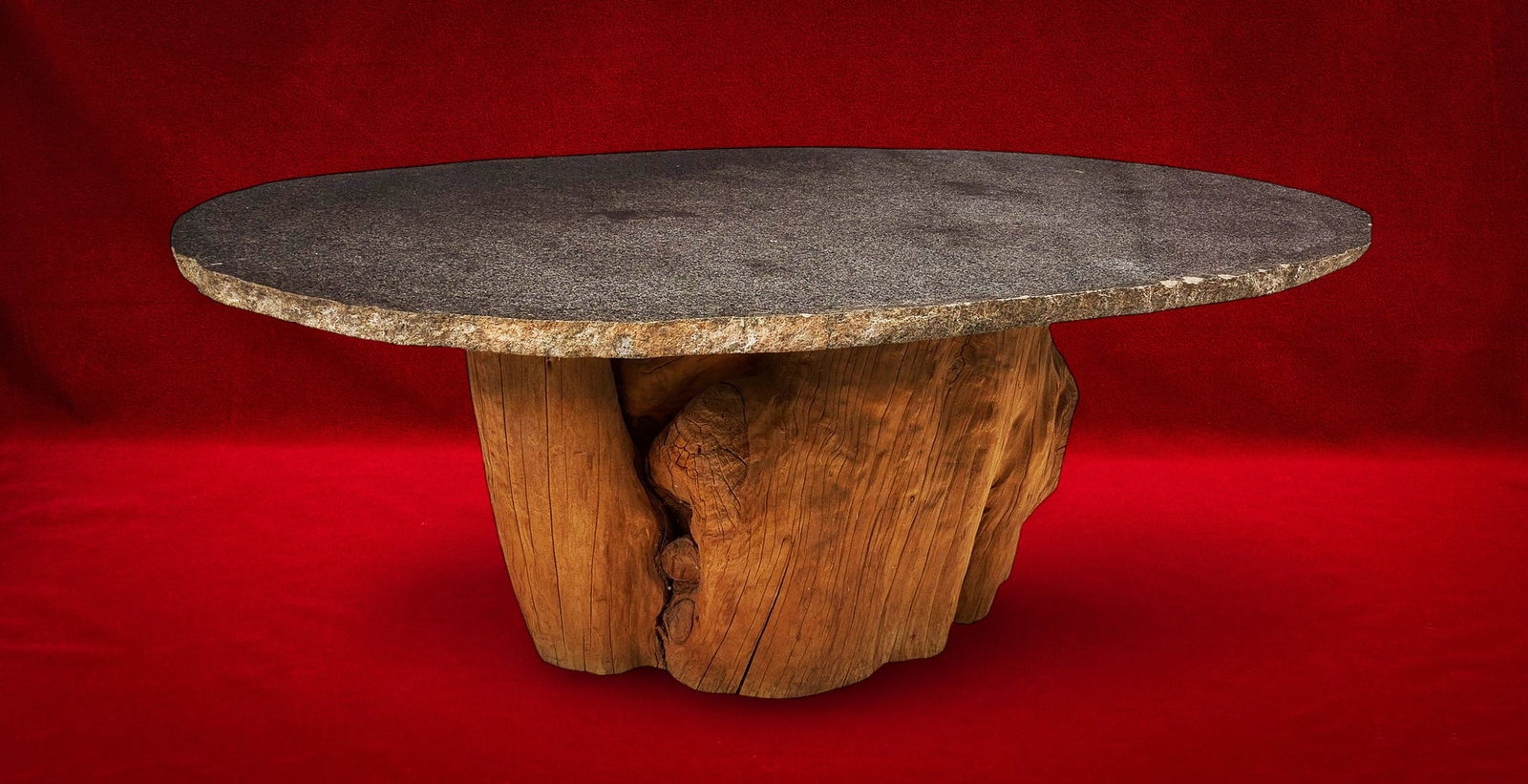 Shelley Duvall | Garden Table: Large rustic garden table, the centerpiece of Shelley Duvall's great room at her ranch home near Blanco, Texas, with substantial naturalistic base, rough-hewn 2-inch marble slab top supported
