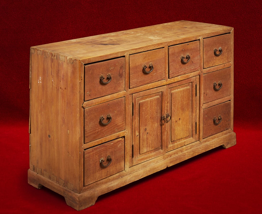 Shelley Duvall | Sideboard: Rustic pine dovetailed sideboard, prominently used in Shelley Duvall's master bedroom, with eight drawers surrounding double cupboard doors with cast metal drop handles height 31 in. x width