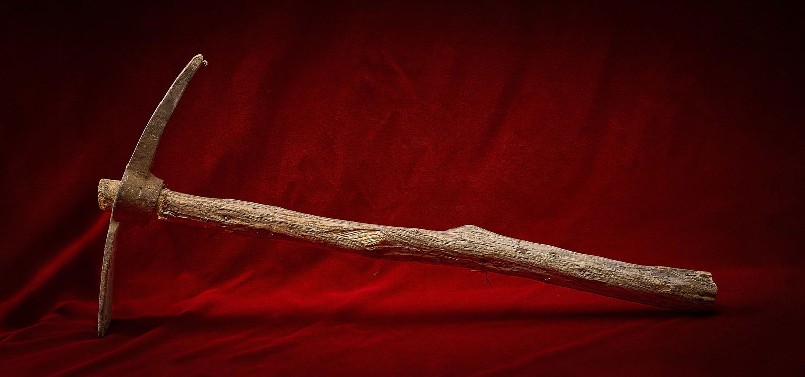 Shelley Duvall | Axe: Rustic antique pickaxe with hand-forged iron head and heavily weathered wooden handle height 32 in. x width 15 in. x depth 3 in. Provenance: Property from the personal estate of celebrated actre