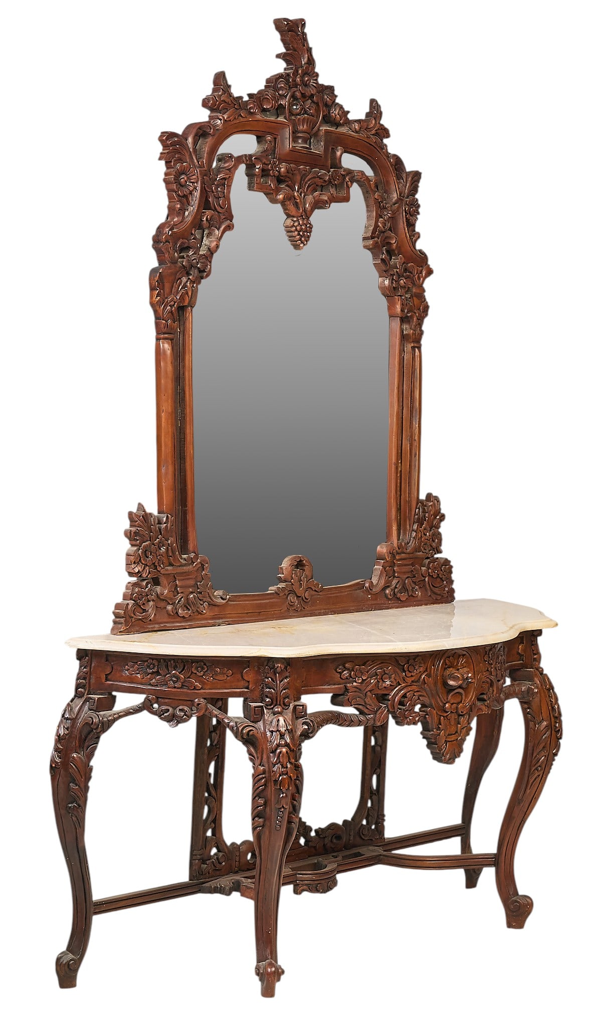 Marble Top Console Table and Mirror: Marble top console table with pierced apron and carved legs with foliate motifs, supported on scrolled cabriole legs, with matching mirror in heavily carved frame, circa mid to late 20th century&