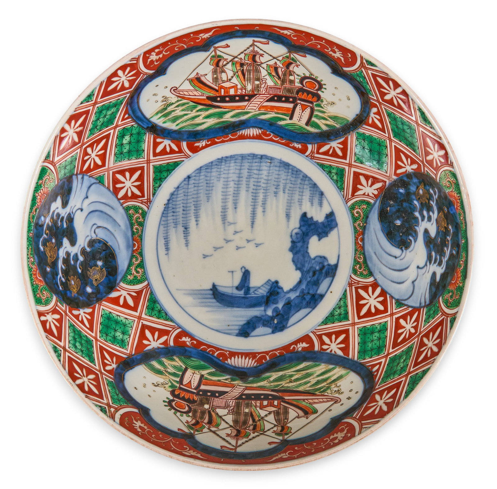 Japanese Imari Porcelain Bowl: Large Japanese Imari porcelain bowl, with interior decorated with a central medallion depicting a boat scene, surrounded by panels of ships and waves height 3.75 in. x diameter 10.75 in. Provena