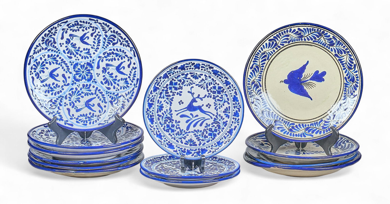 (13) Mexican Talavera Plates: Collection of thirteen vintage hand-thrown Mexican Talavera (Puebla, Mexico) chargers with decorative borders, and flora and fauna motifs, several signed and marked, circa 20th century diame