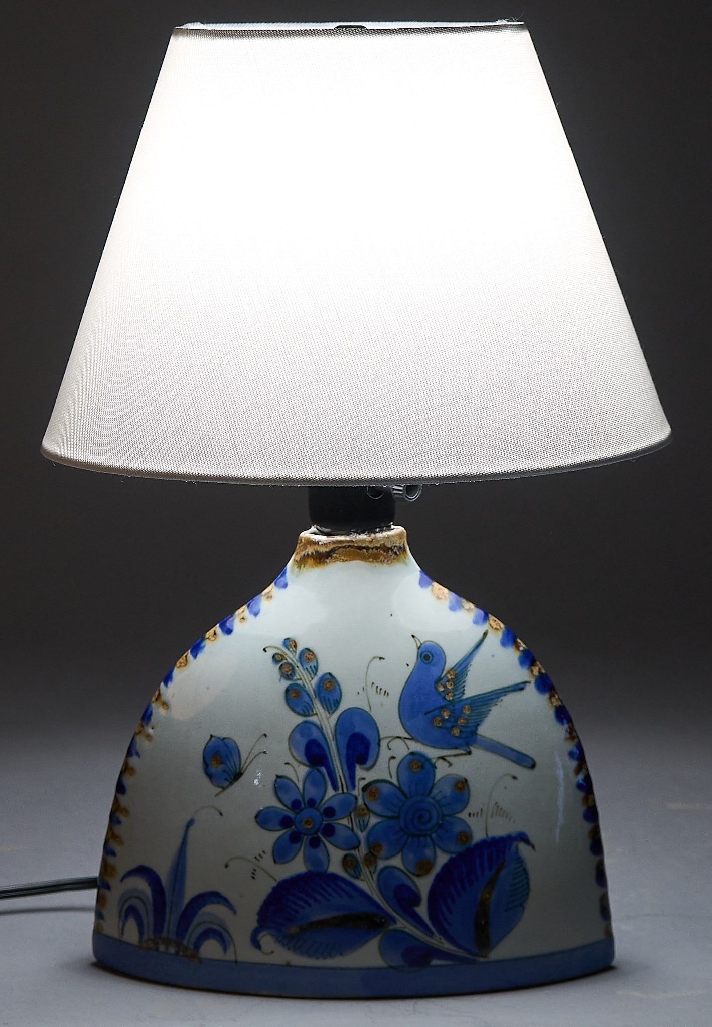 Ken Edwards, Tonala Pottery Lamp: Attributed to Ken Edwards (Missouri / Guatemala, 1926-2022), Tonala lamp with hand-painted floral and bird design on a ceramic body, includes a white fabric shade, marked "El Palomar, Mexico