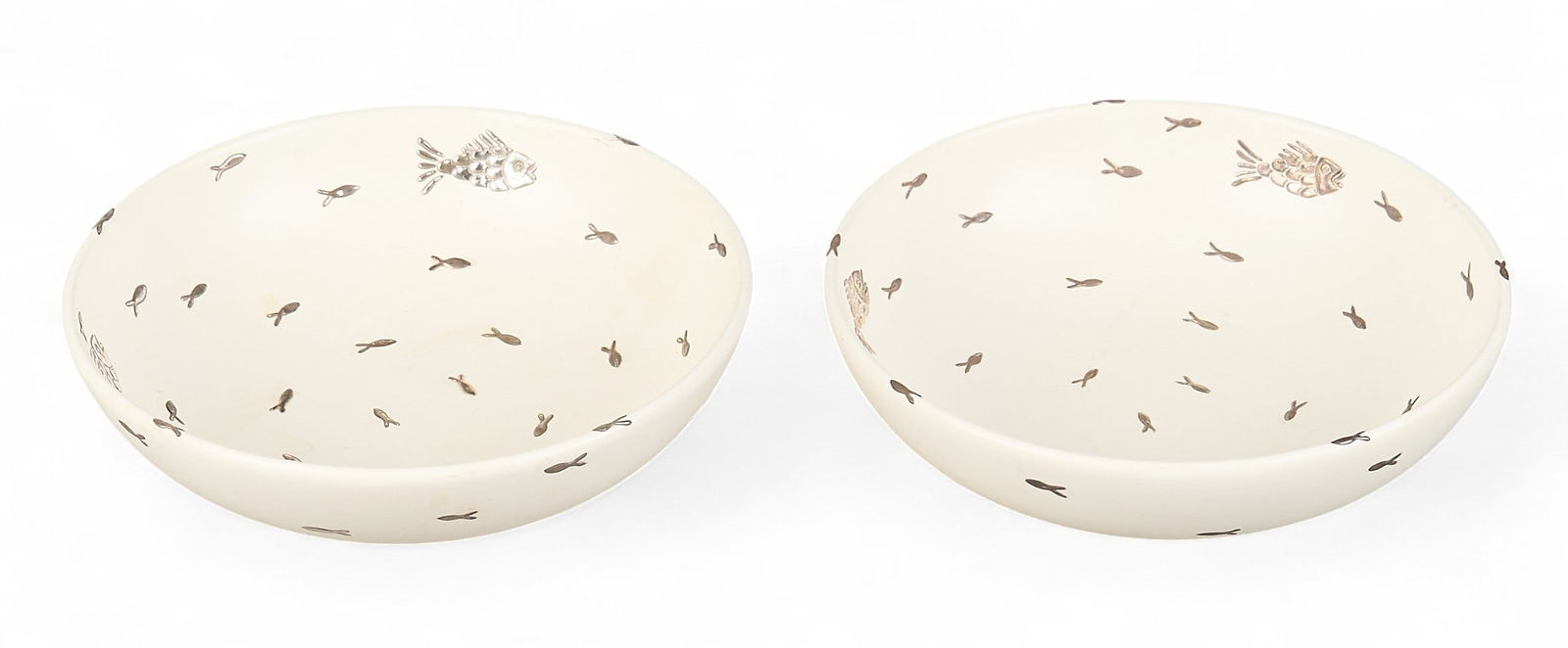 (2) Emilia Castillo, White Bowls: Emilia Castillo (Taxco, Mexico, b. 1958), ceramic white bowls, with sterling silver fish motif overlay, marked with "Emilia Castillo Pure Silver Mexico" stamp to bottom height 2 in