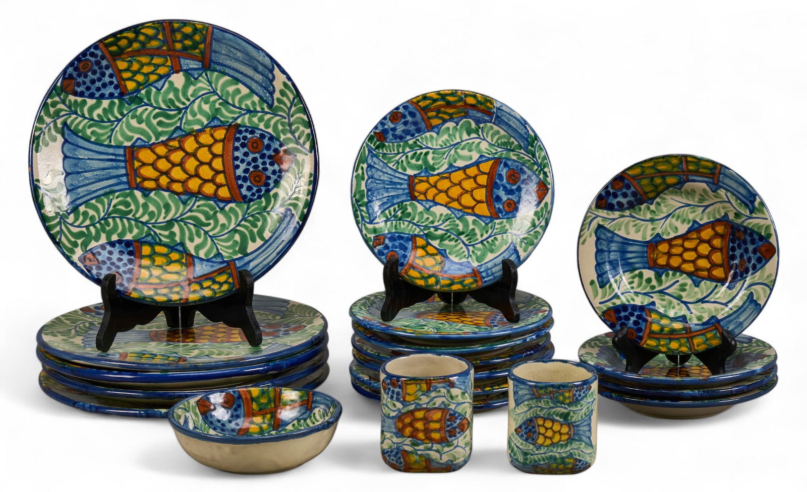 Dolores Hidalgo, Dishware: Collection of Amora (Dolores Hidalgo, b. 20th century) hand-painted ceramics, with five dinner plates, seven salad plates, four soup bowls, one small bowl, and pair of cups, all signed "Amora&quo
