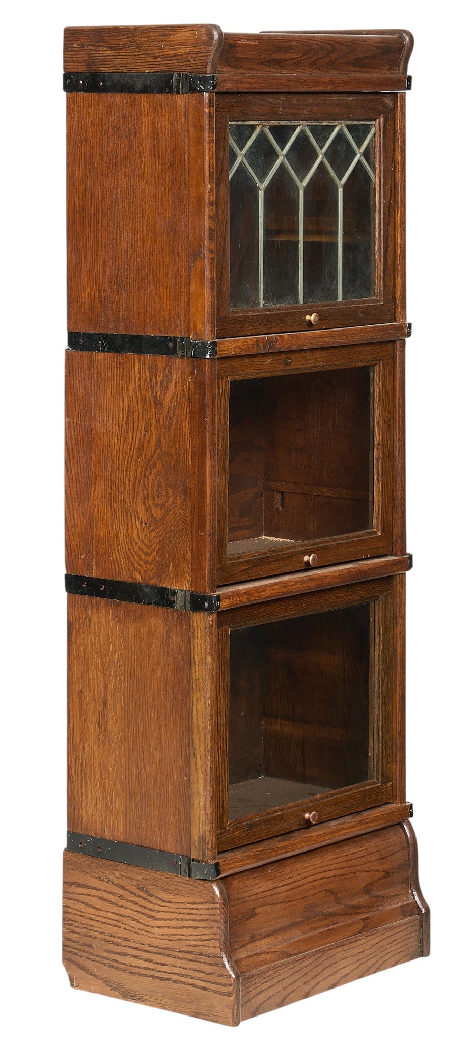 Three-Tier Stacking Bookcase: Stacking bookcase with three glass-front modules, with top section having metal arcading height 49 in. x width 17 in. x depth 10.25 in. Provenance: Property from a home in San Antonio, Texas