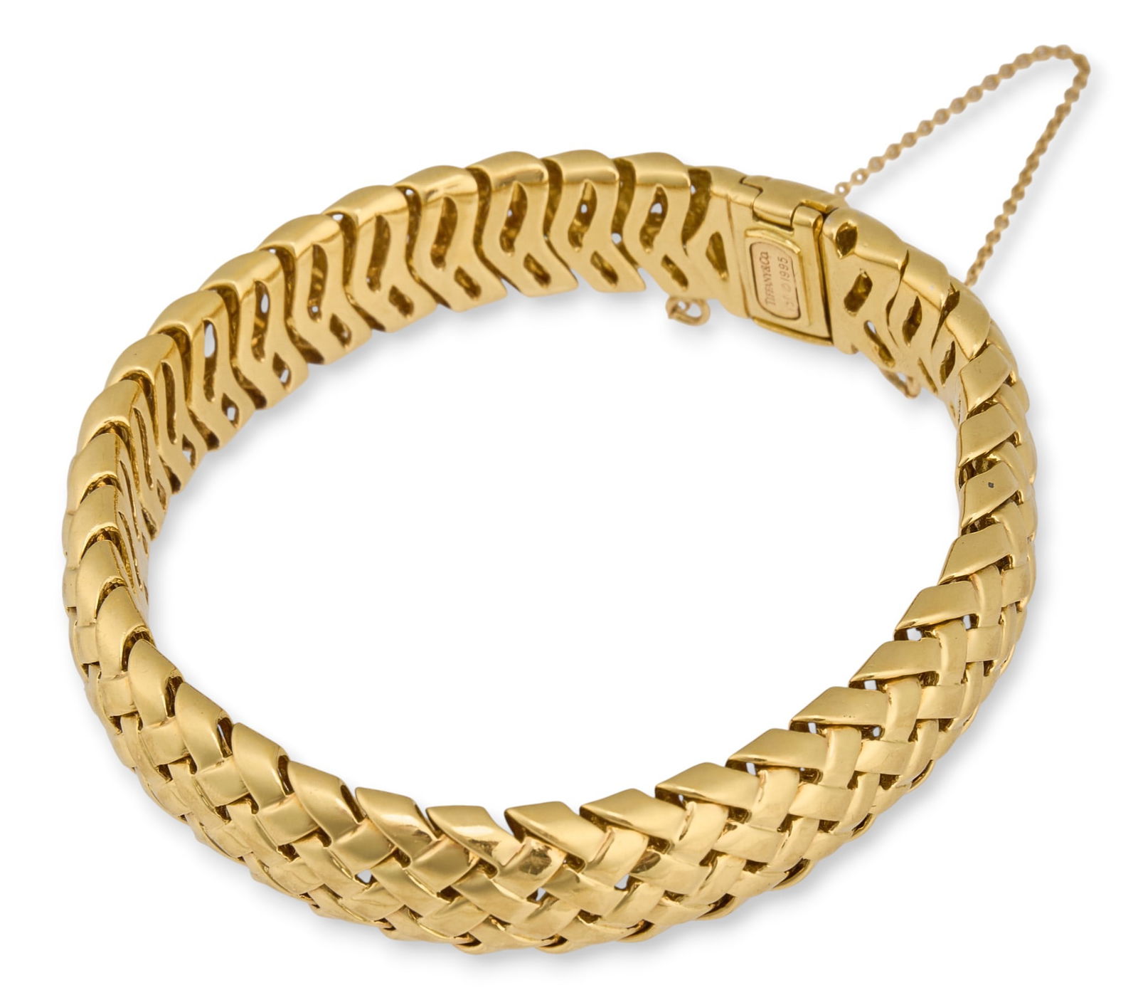 Tiffany & Co. Vannerie 18K Gold Bracelet: Tiffany & Co. Vannerie 18K yellow gold bracelet, stamped "Tiffany, 1995, 750" Length: 6.25 in.Total weight: 49.13 g Provenance: Property from the Terrell Hills, Texas estate of dist