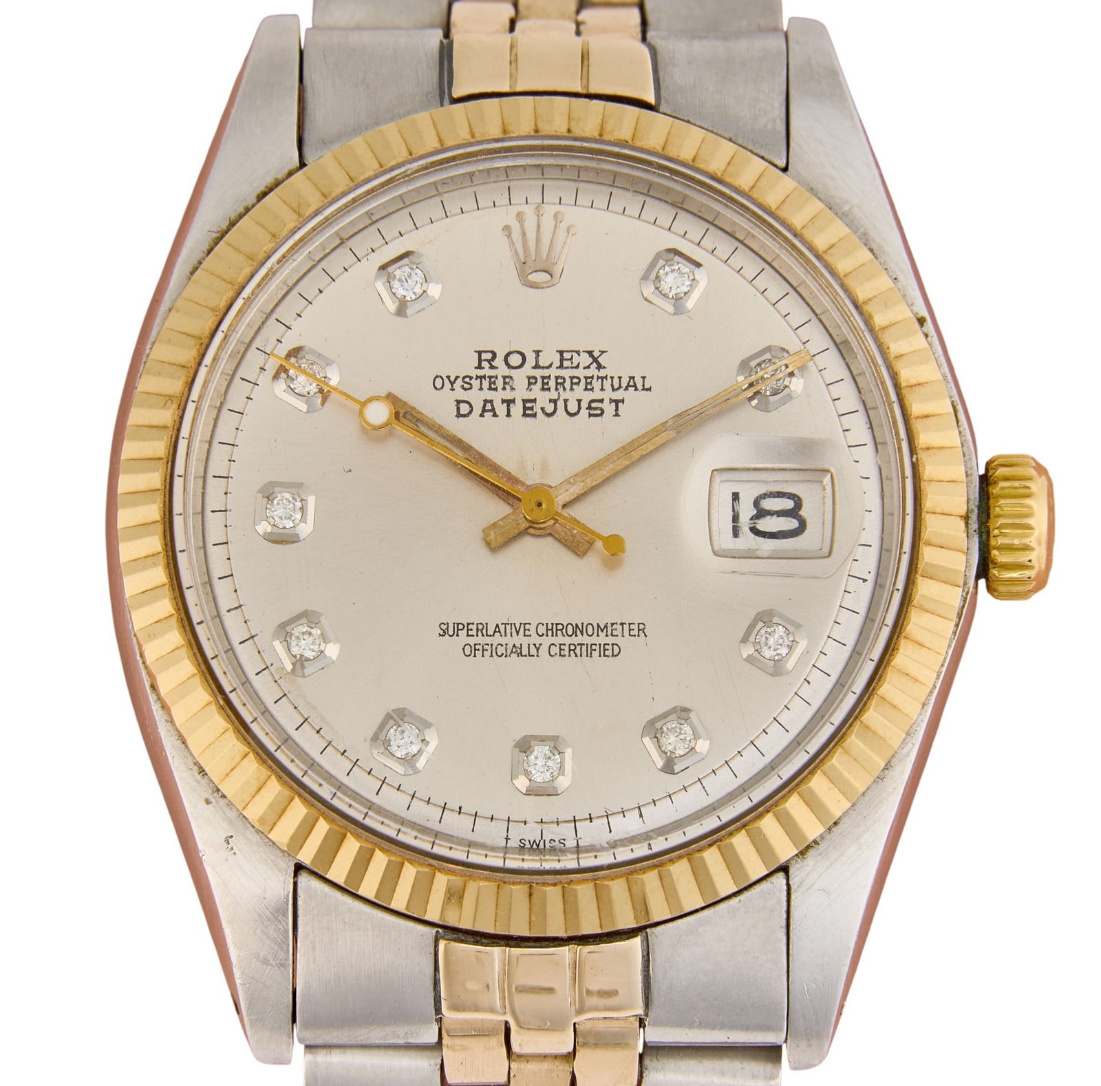 1974 Rolex Datejust 18K and Stainless Steel Watch: Vintage Rolex wrist watch, 18K and stainless steel, with silver dial and diamond markers, 18K yellow gold bezel and 18K and stainless steel jubilee band, includes appraisal certificate, and inner and