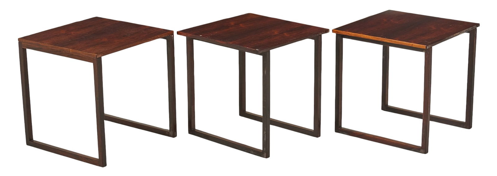 (3) Kai Kristiansen Nesting Tables: Set of three Kai Kristiansen (b. 1929, Denmark) mid-century rosewood nesting tables height 16 in. x width 17 in. x depth 16 in. / largest Provenance: Property from a beautifully restored mid-cen