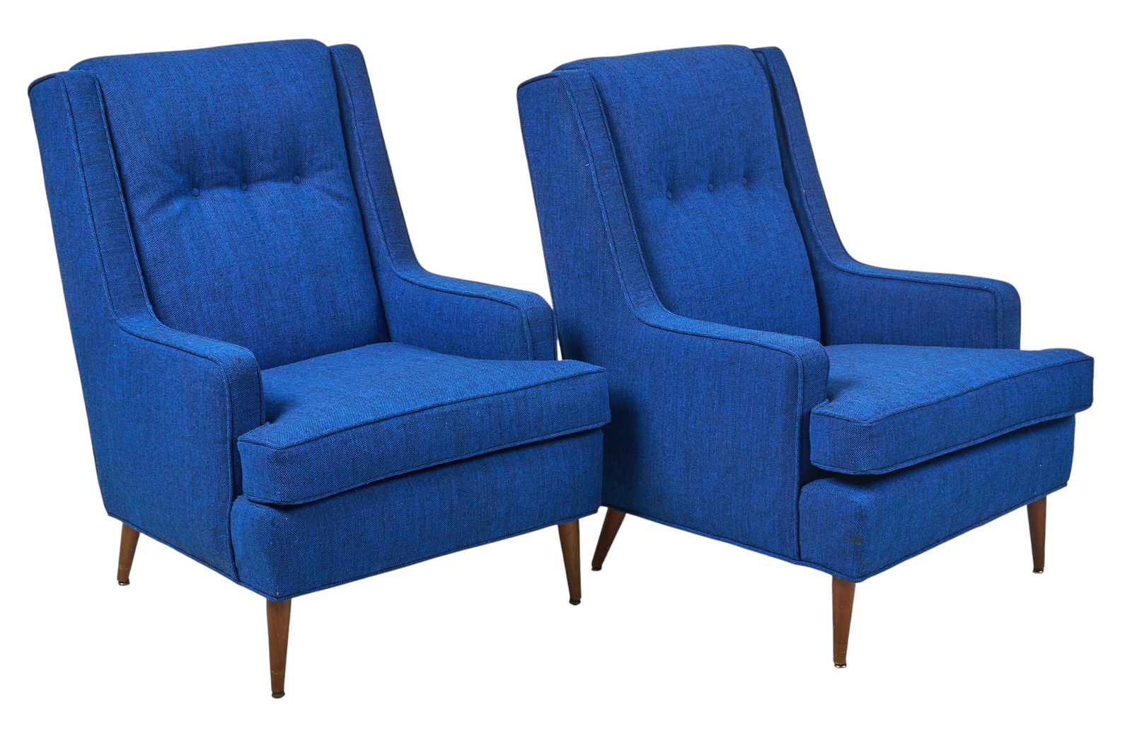 Pair of Blue Armchairs: Pair of upholstered armchairs, with tufted backs and removable seat cushions, padded armrests, in cobalt upholstered fabric, supported on tapered pin legs height 38 in. x width 29 in. x depth 36