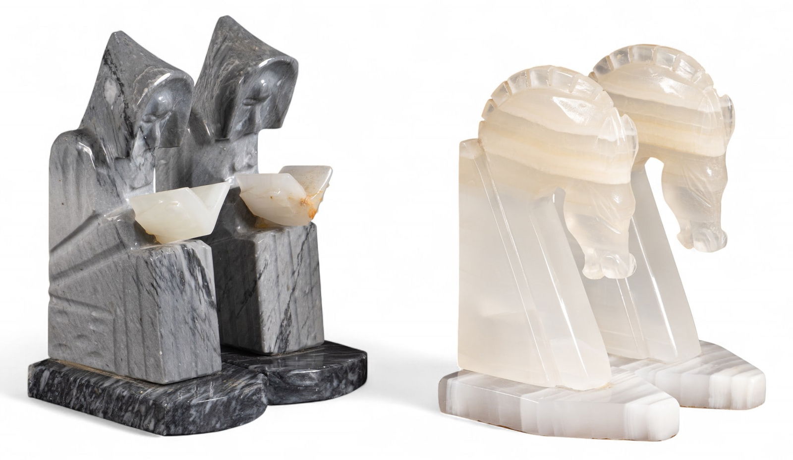(4) Marble and Alabaster Bookends: Collection of four bookends, two carved from gray marble depicting monks, and two carved from white alabaster depicting horse heads height 8 in. x width 3 in. x depth 5 in. / large