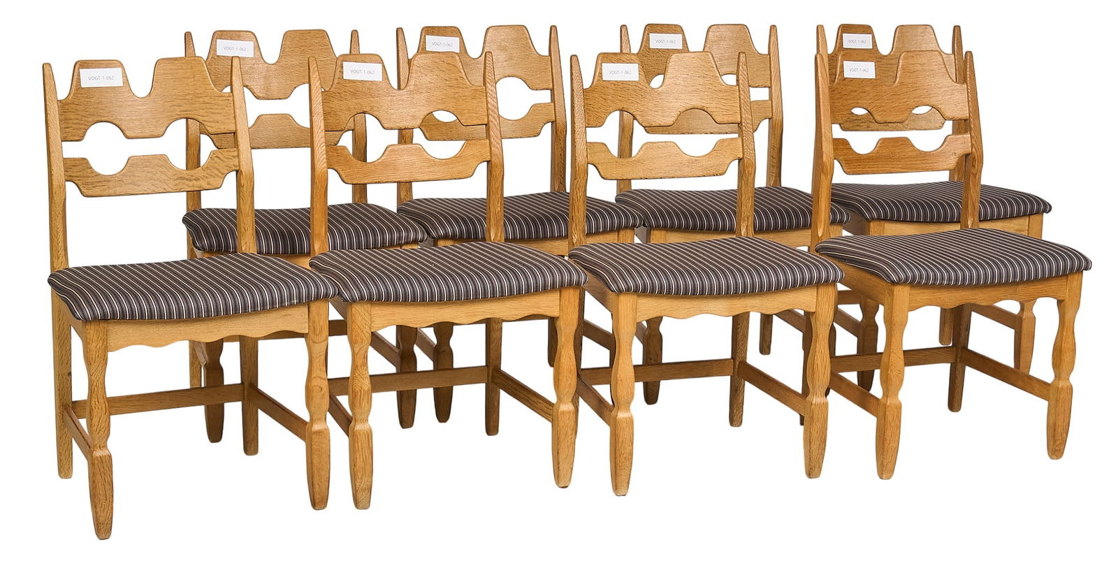 Set of (8) Henning Kjaernulf Razorblade Chairs: Set of eight Henning Kjaernulf (Denmark) for Nyrup Mobelfabrik (Denmark) Razorblade oak dining chairs with stylized backrest, and cushioned seats with striped fabric, supported on shaped block le