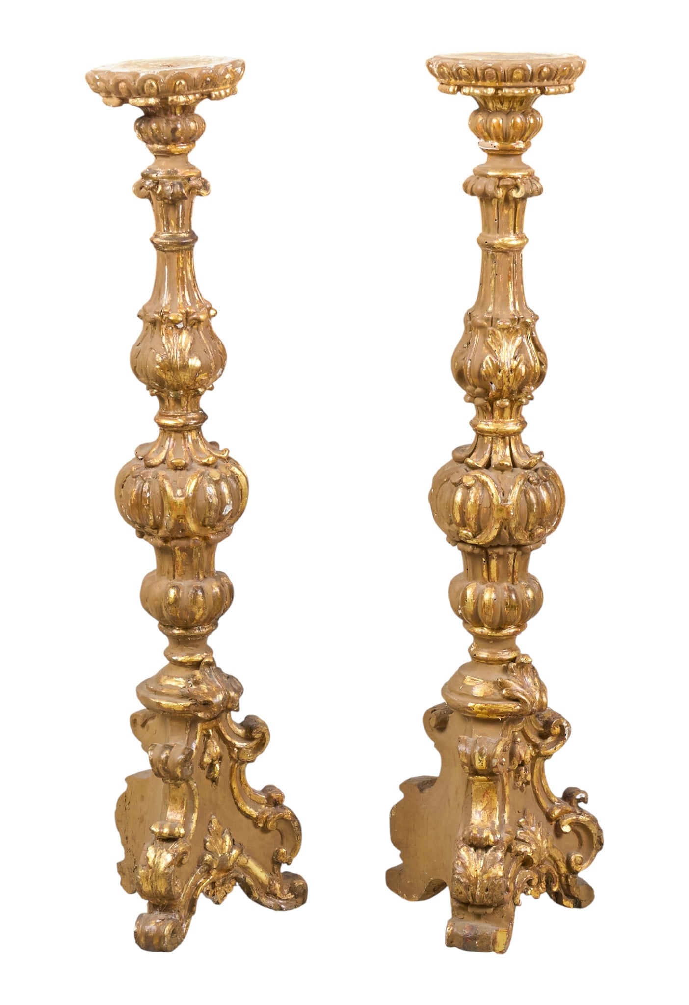 Pair of Large Candlesticks: Pair of molded candelsticks with partial gold paint finish height 40 in. x width 10 in. x depth 10 in. Provenance: Property from a home in San Antonio, Texas Condition: chipped in several