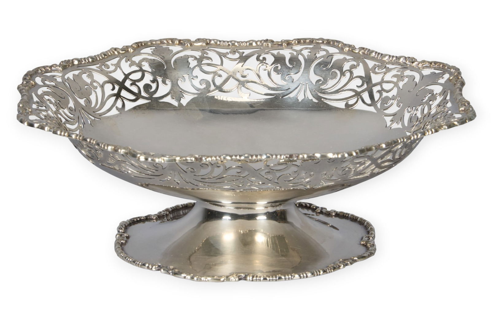 Mappin & Webb Co. Sterling Bowl: Mappin and Webb Co. sterling silver bowl, with reticulated design and repousse edge, marked "Mappin and Webb" height 2.75 in. x diameter 8.5 in. Total weig
