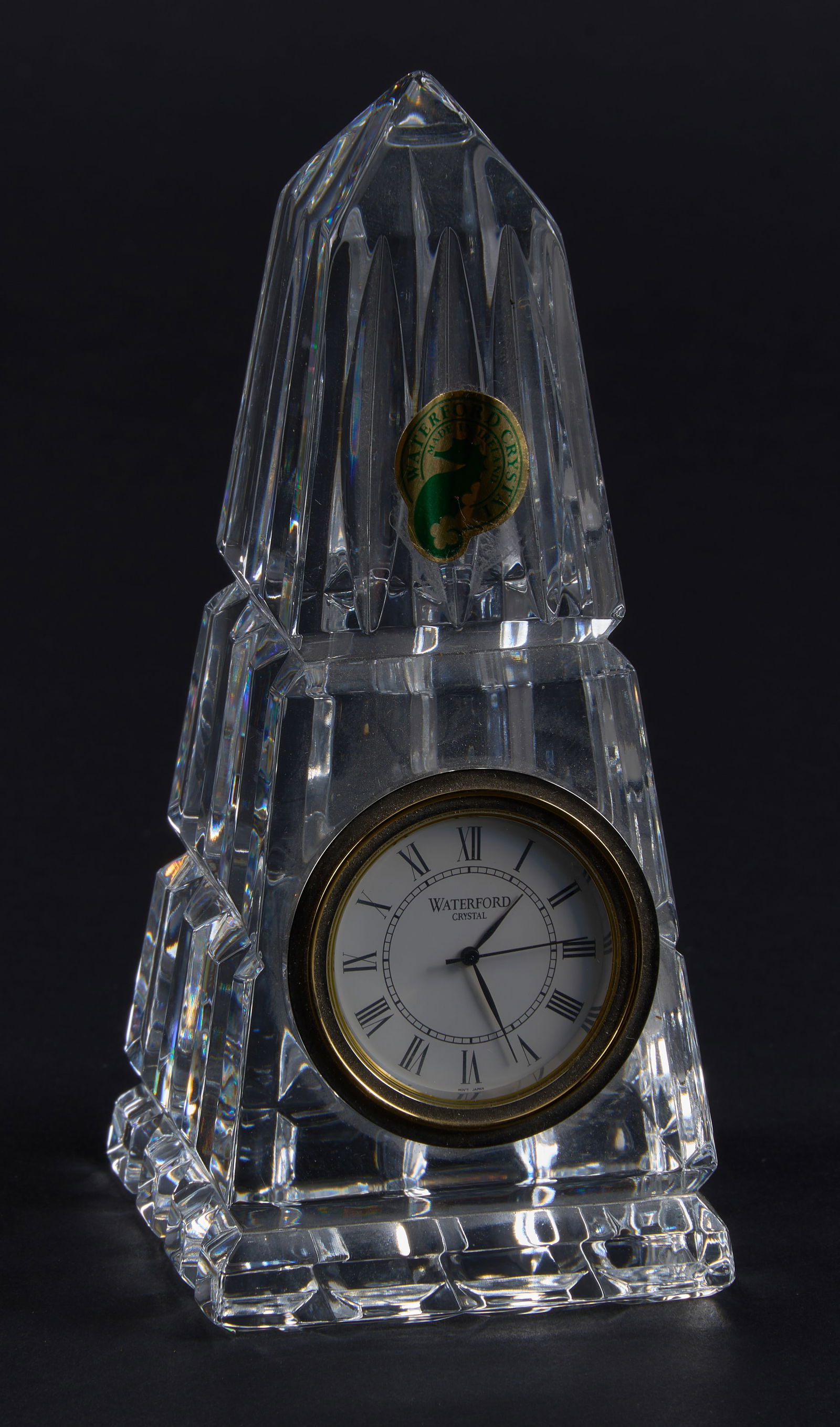 Waterford Crystal Obelisk Clock: Small Waterford crystal obelisk clock, marked "Waterford Ireland" to underside height 5.5 in. x width 2.5 in. x depth 2.5 in.