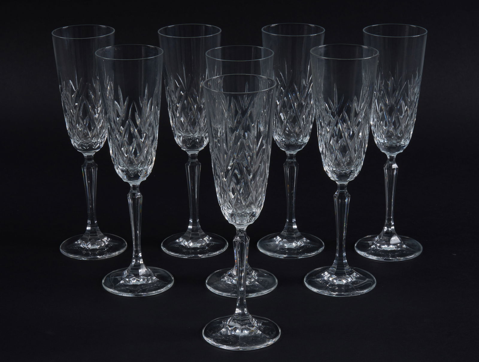 (8) Crystal Flutes: Set of eight crystal stemware flutes, unmarked height 9.25 in. x diameter 3 in. / each Provenance: Property from the personal collec