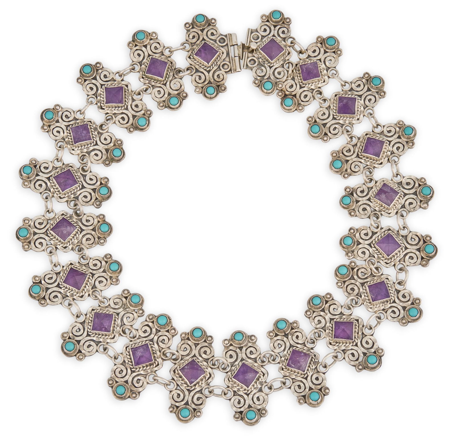 Mexican Sterling Amethyst & Turquoise Necklace: Mexican sterling silver bracket necklace, with pyramid-cut amethysts and turquoise cabochons, scrolled details, marked "Mexico TS-121 Sterling" Length: 17.5 in.Total weight: 5.22 ozt