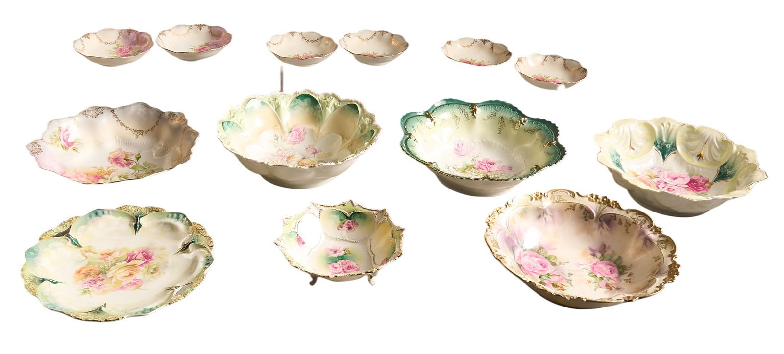 (13) Pieces of R.S. Prussia Porcelain: Collection of thirteen decorative R.S Prussia porcelain bowls and plates, with various sizes and styles of floral patterns height 3 in. x diameter 11 in. / largest Provenance: Property from a ho
