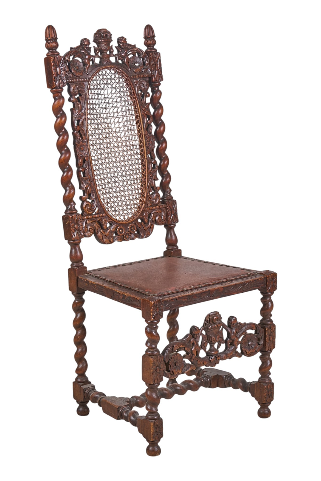Antique Carolean Style Cane Chair: Antique Carolean style mahagony chair with cane backrest, and barley twists, supported on turned legs with decorative apron, circa late 19th cen