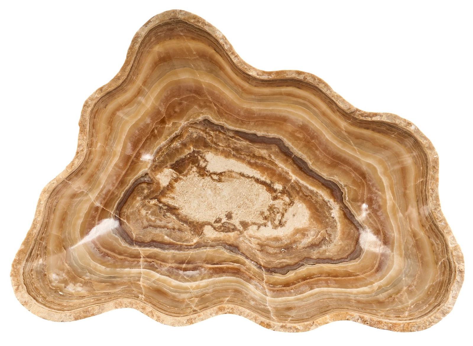 Large Ringed Onyx Bowl: Large ringed amber-colored onyx bowl with organic shape height 5 in. x width 20 in. x depth 15 in. Provenance: Property from a home in Boerne, Texas