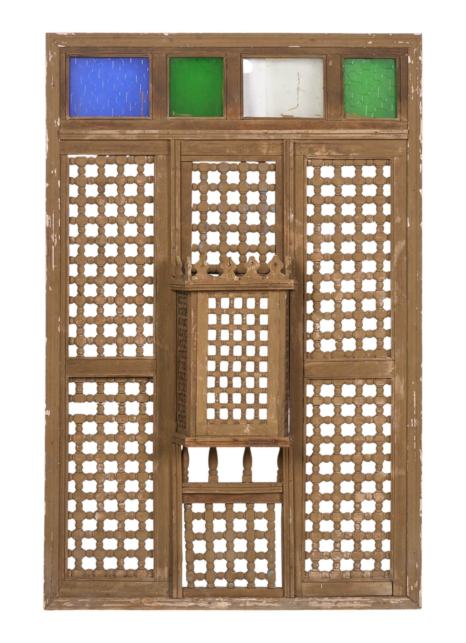 Mashrabiya Screen with Stained Glass: Mashrabiya screen with projecting window, stained glass panels, and turned geometric latticework height 79.5 in. x width 52 in. x depth 10 in. Provenance: Property from the personal c