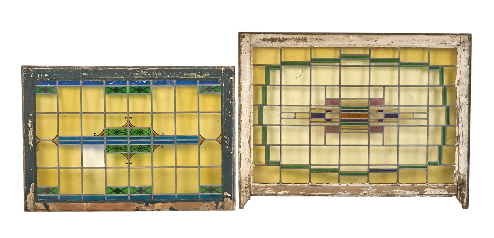(2) Prairie Style Stained Glass Window Panels: Set of two Prairie style stained glass window panels, each with geometric designs, set in wooden frames height 35 in. x width 45 in. x depth 1.5 in. / largest Provenance: Property from a ho