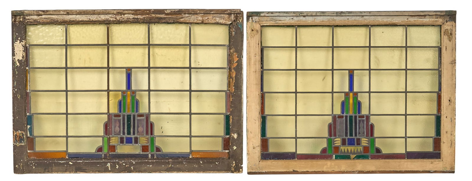 Pair of Prairie Style Stained Glass Window Panels: Pair of Prairie style stained glass window panels, with geometric designs, set in wooden frames height 32 in. x width 44 in. x depth 2 in. / each Provenance: Property from the personal collection