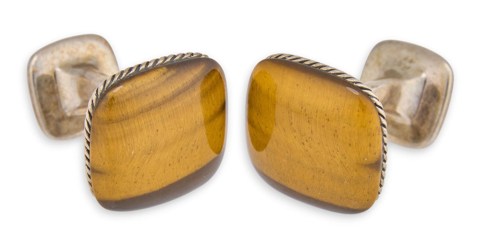 T.R. Fehrenbach | David Yurman Tiger's Eye Cufflinks: David Yurman sterling silver cufflinks, with inlaid tiger's eye, marked "925" and "David Yurman"Total weight: 0.60 oztProvenance: The personal estate of noted Texas historian